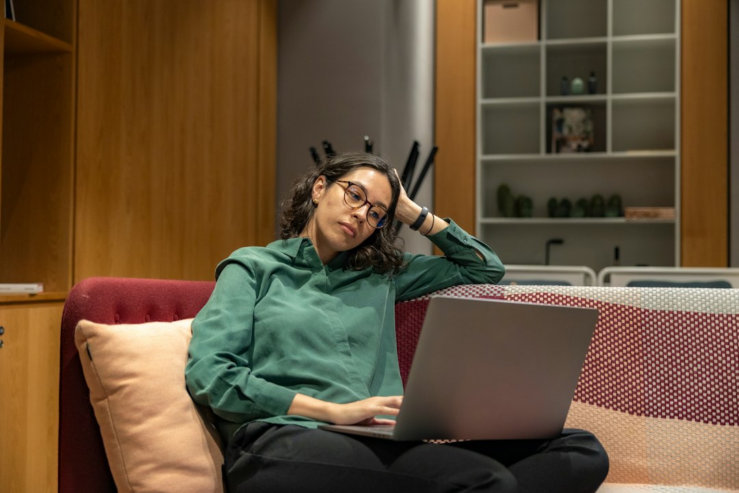 Adult using a laptop in a calm workspace